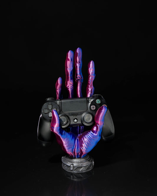 Gaming controller shaped like a hand with purple and blue accents on a black background